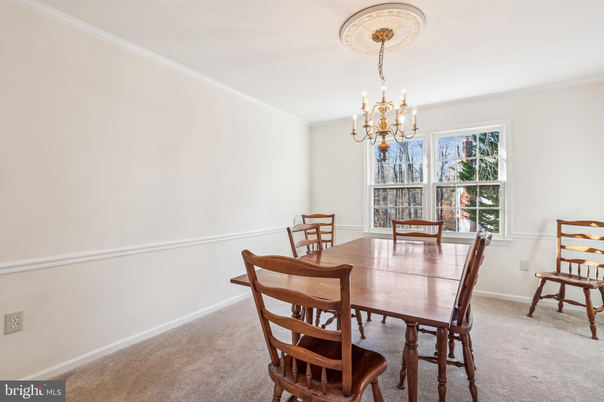 7122 Rolling Forest Avenue Springfield, VA 22152 - Photo 9 of 58 a dining room with furniture and window