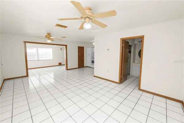 a view of an empty room and window