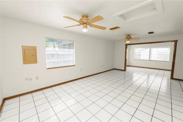 a view of an empty room and window
