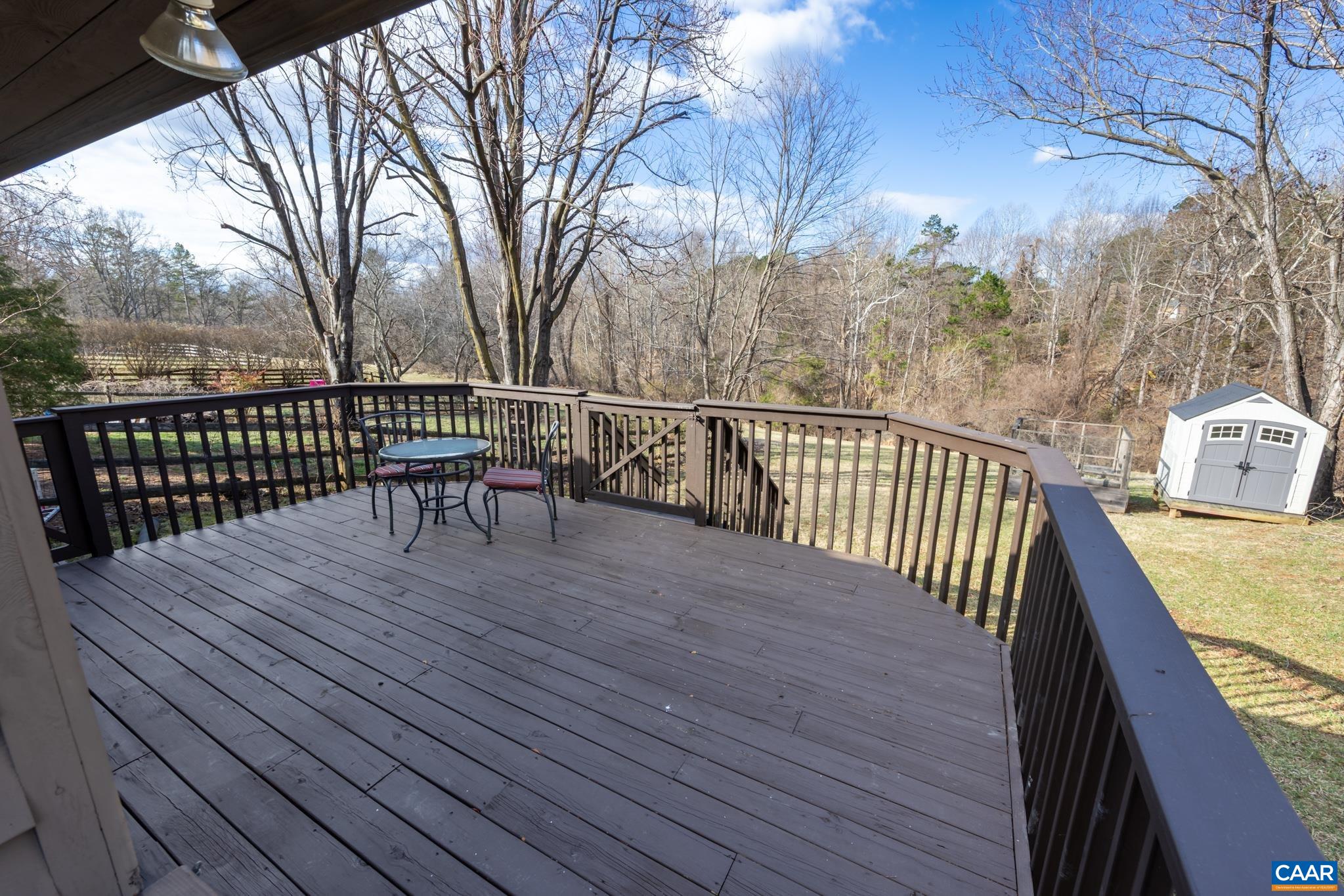 1006 Amber Ridge Road Charlottesville, VA 22901 - Photo 23 of 28 a view of balcony with wooden floor and fence
