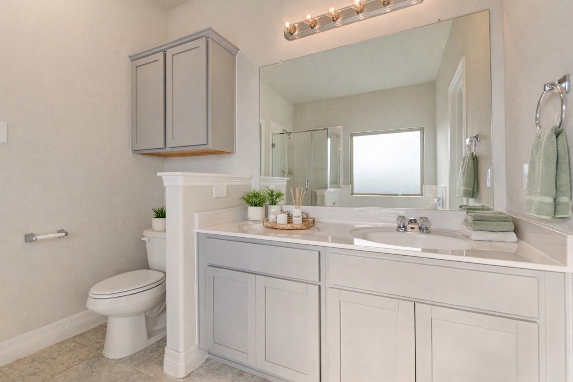 33026 School Hl Road Fulshear, TX 77441 - Photo 16 of 35 Primary bathroom with double vanity - virtually staged