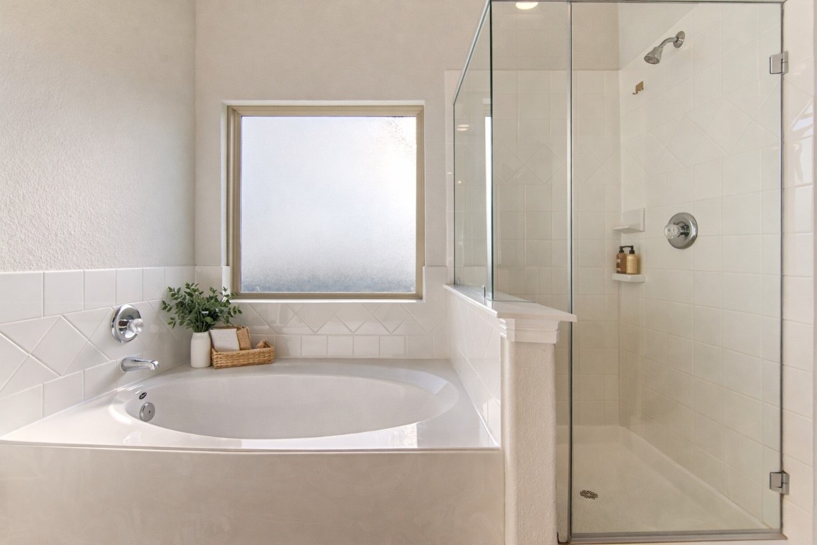 33026 School Hl Road Fulshear, TX 77441 - Photo 17 of 35 Primary bathroom with soaking tub and shower - virtually staged