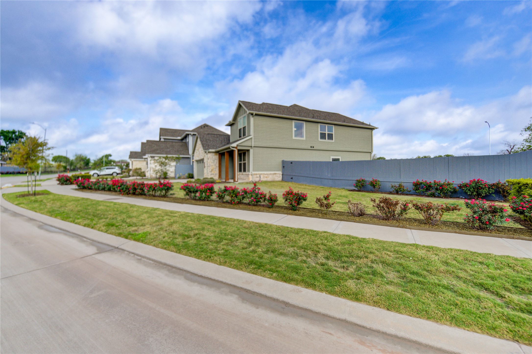 33026 School Hl Road Fulshear, TX 77441 - Photo 34 of 35 Also a generous front yard that has a semi-private feel due to the landscaping.