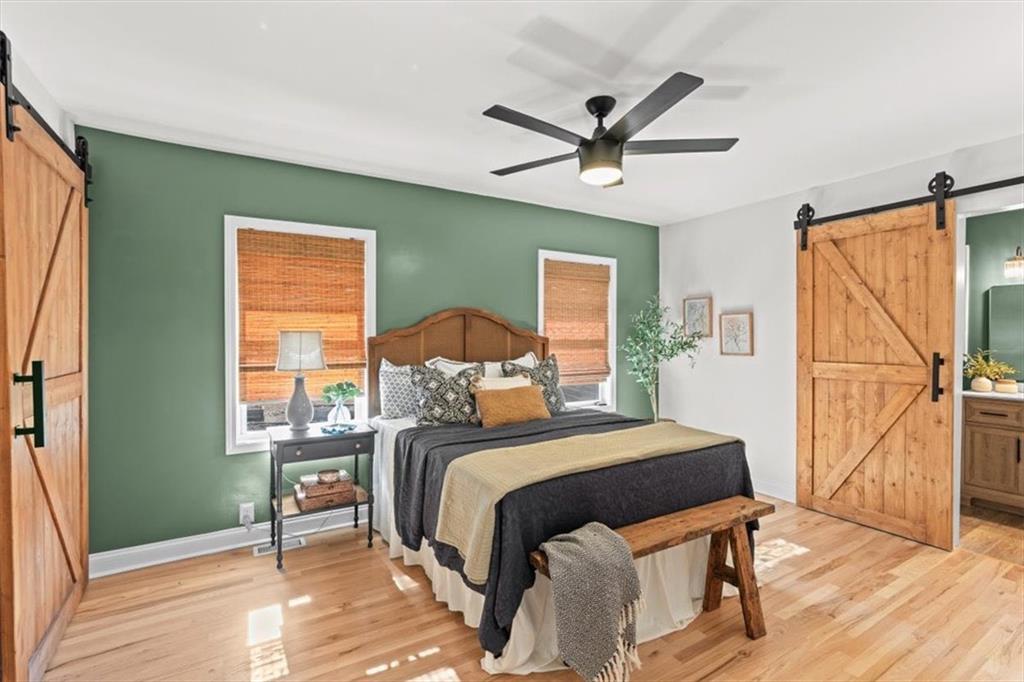 80 Hand Road Bowdon, GA 30108 - Photo 15 of 83 a bedroom with a bed and a window