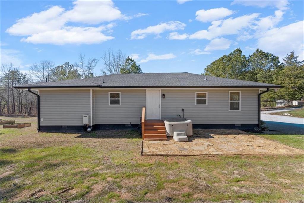 80 Hand Road Bowdon, GA 30108 - Photo 43 of 83 a backyard of a house