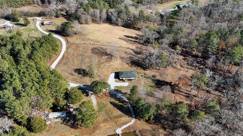 80 Hand Road Bowdon, GA 30108 - Photo 75 of 83 an aerial view of residential house with outdoor space