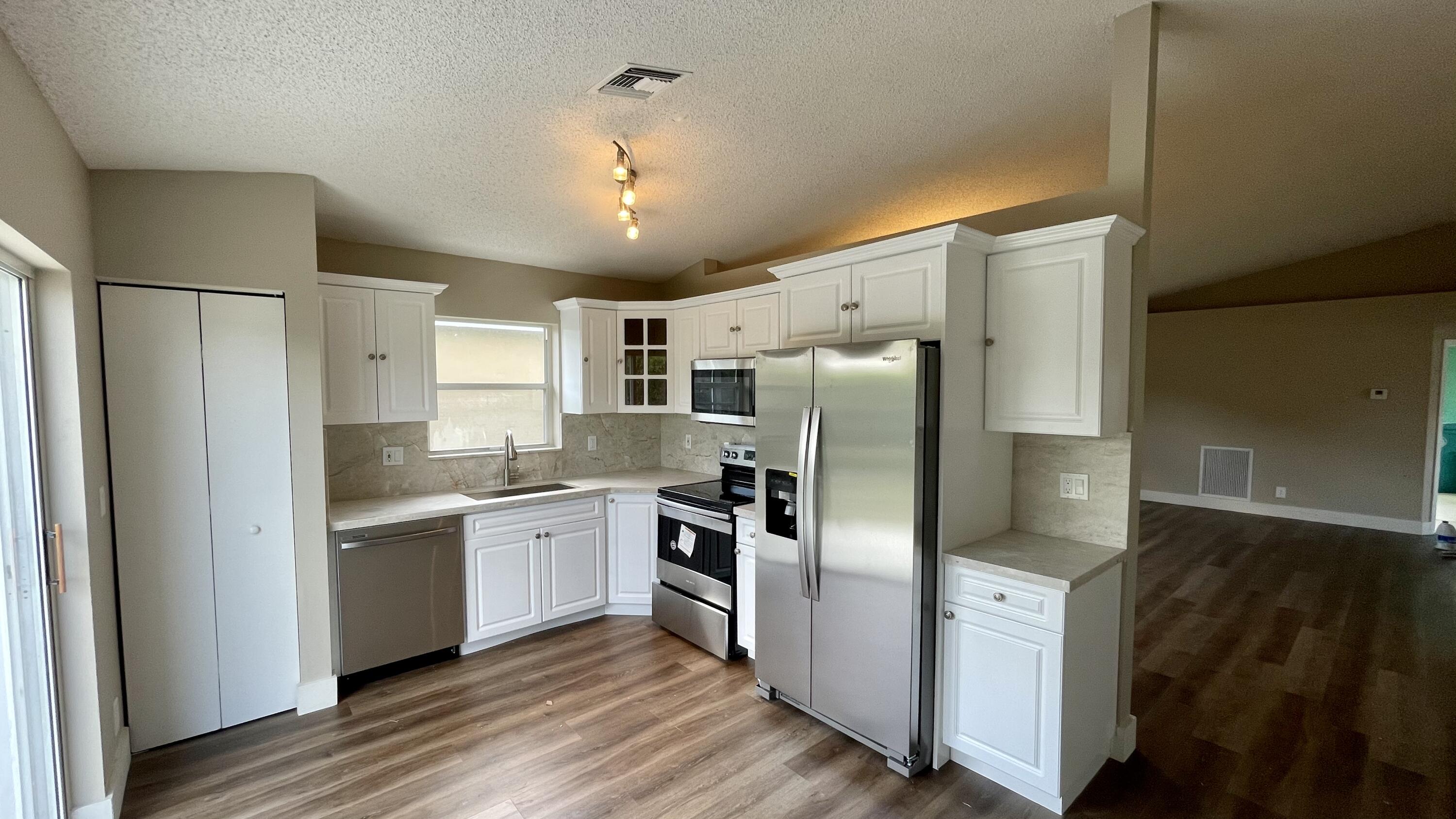 125 Buffet Key Boynton Beach, FL 33426 - Photo 2 of 13 E0D2DA8C-69FB-454C-97A4-7EC8A90D566B