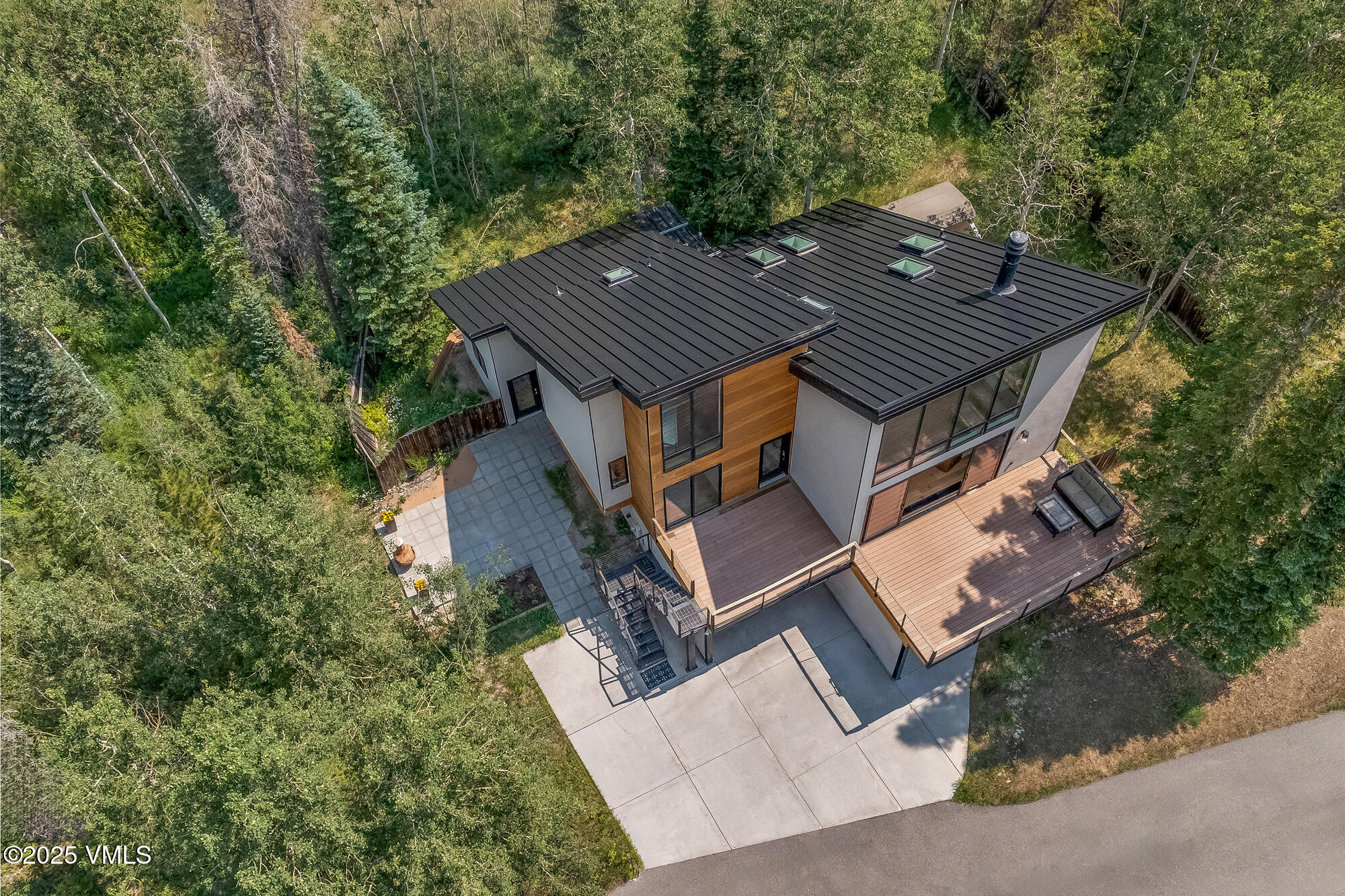 4545 Big Horn Road Vail, CO 81657 - Photo 5 of 49 front view of a house with a yard