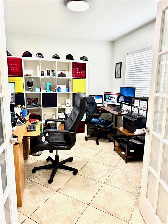 115 Willowbay Ridge Street Sanford, FL 32771 - Photo 12 of 28 a livingroom with workspace and a couch