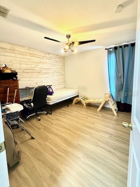 115 Willowbay Ridge Street Sanford, FL 32771 - Photo 19 of 28 a view of a room with furniture and a ceiling fan