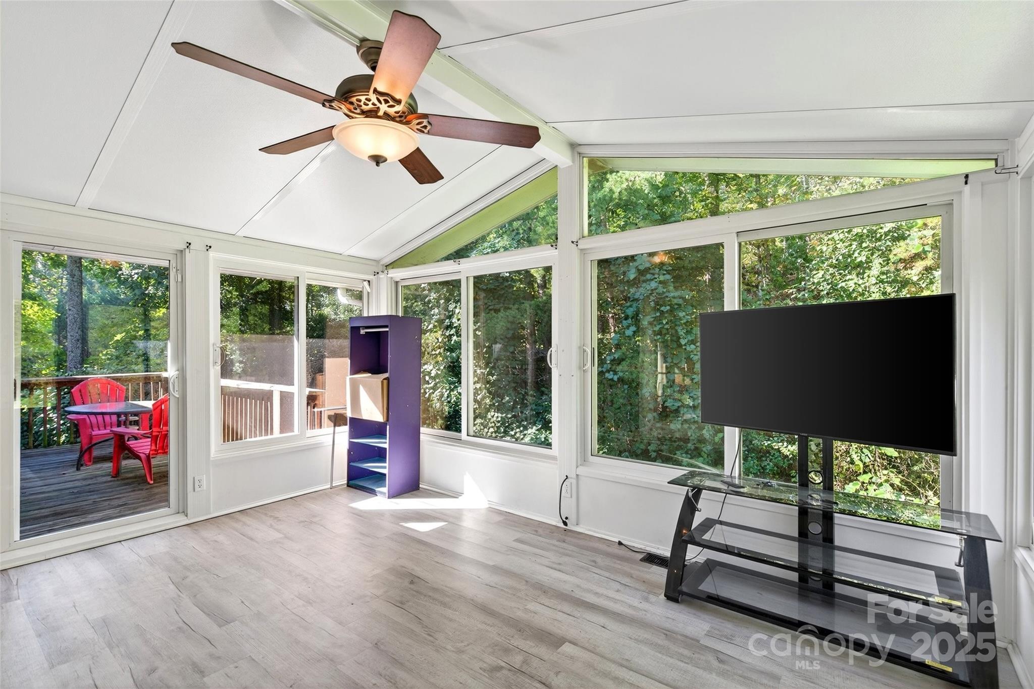86 Springdale Drive Marion, NC 28752 - Photo 13 of 40 a view of an room with furniture wooden floor and a ceiling fan