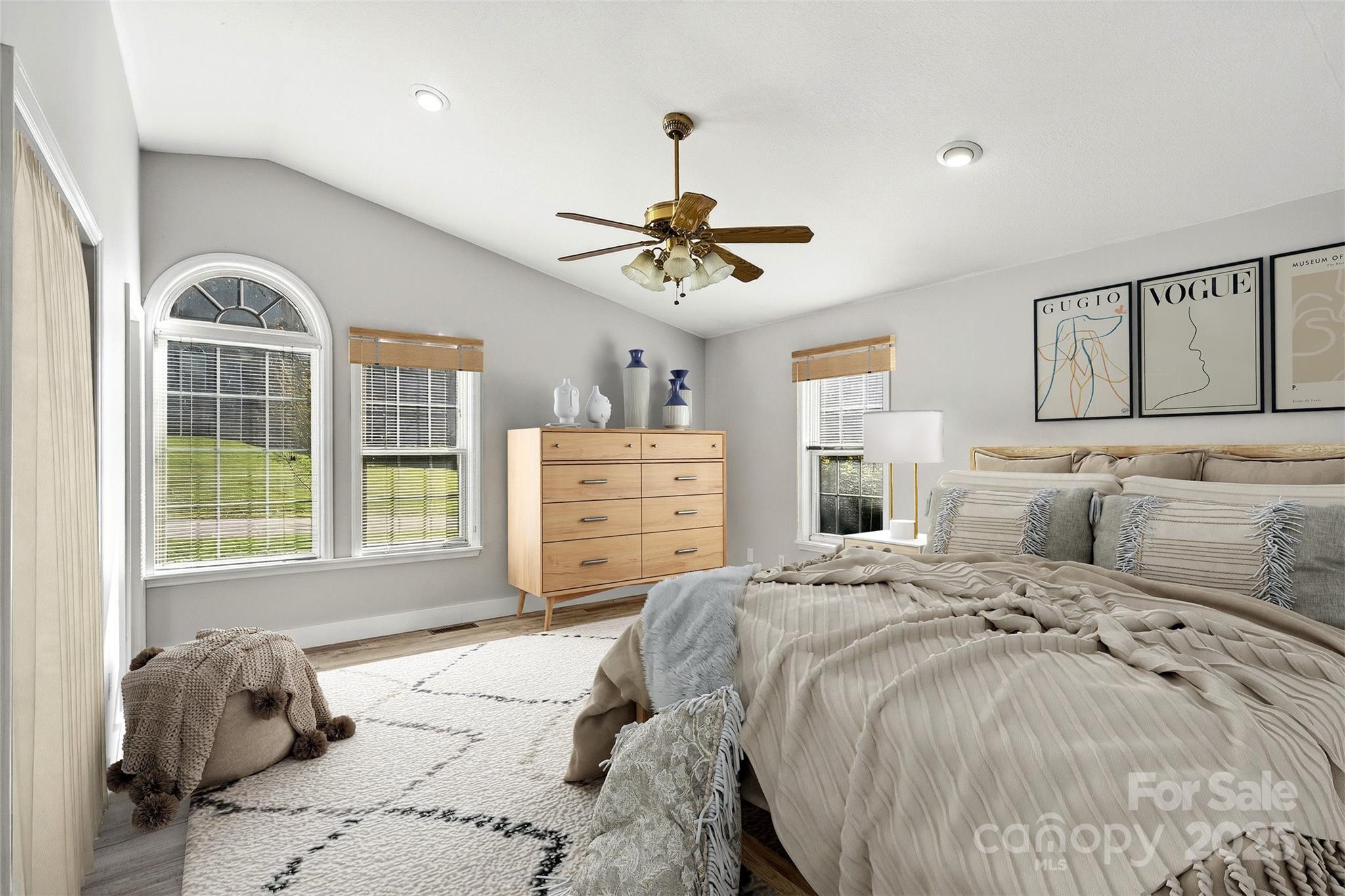 86 Springdale Drive Marion, NC 28752 - Photo 17 of 40 a spacious bedroom with a bed dresser and a window