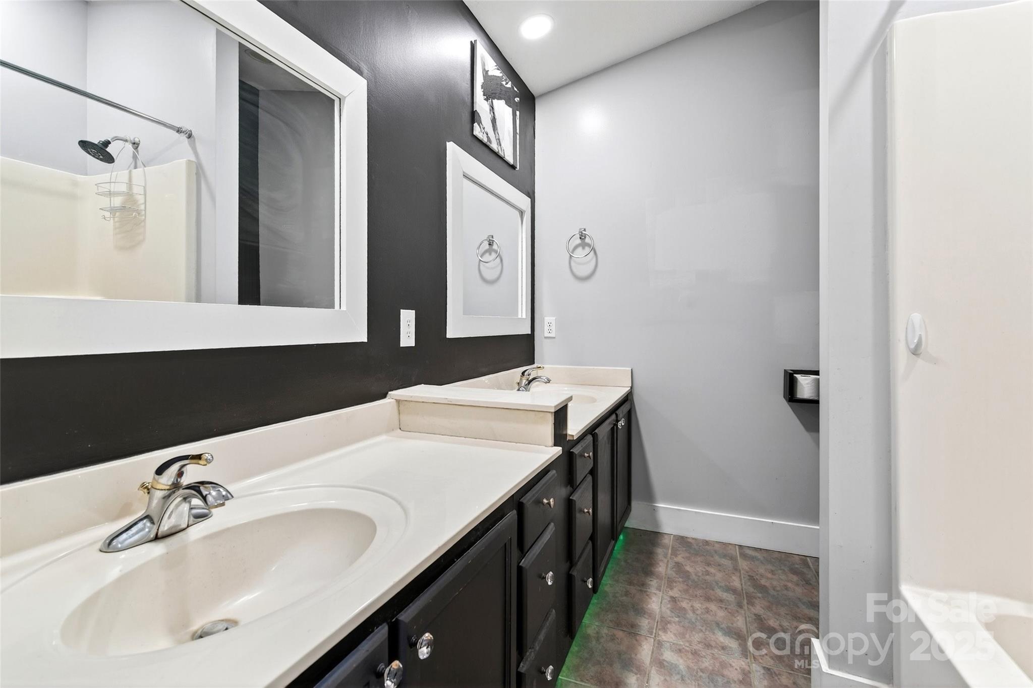 86 Springdale Drive Marion, NC 28752 - Photo 24 of 40 a bathroom with a sink and a mirror