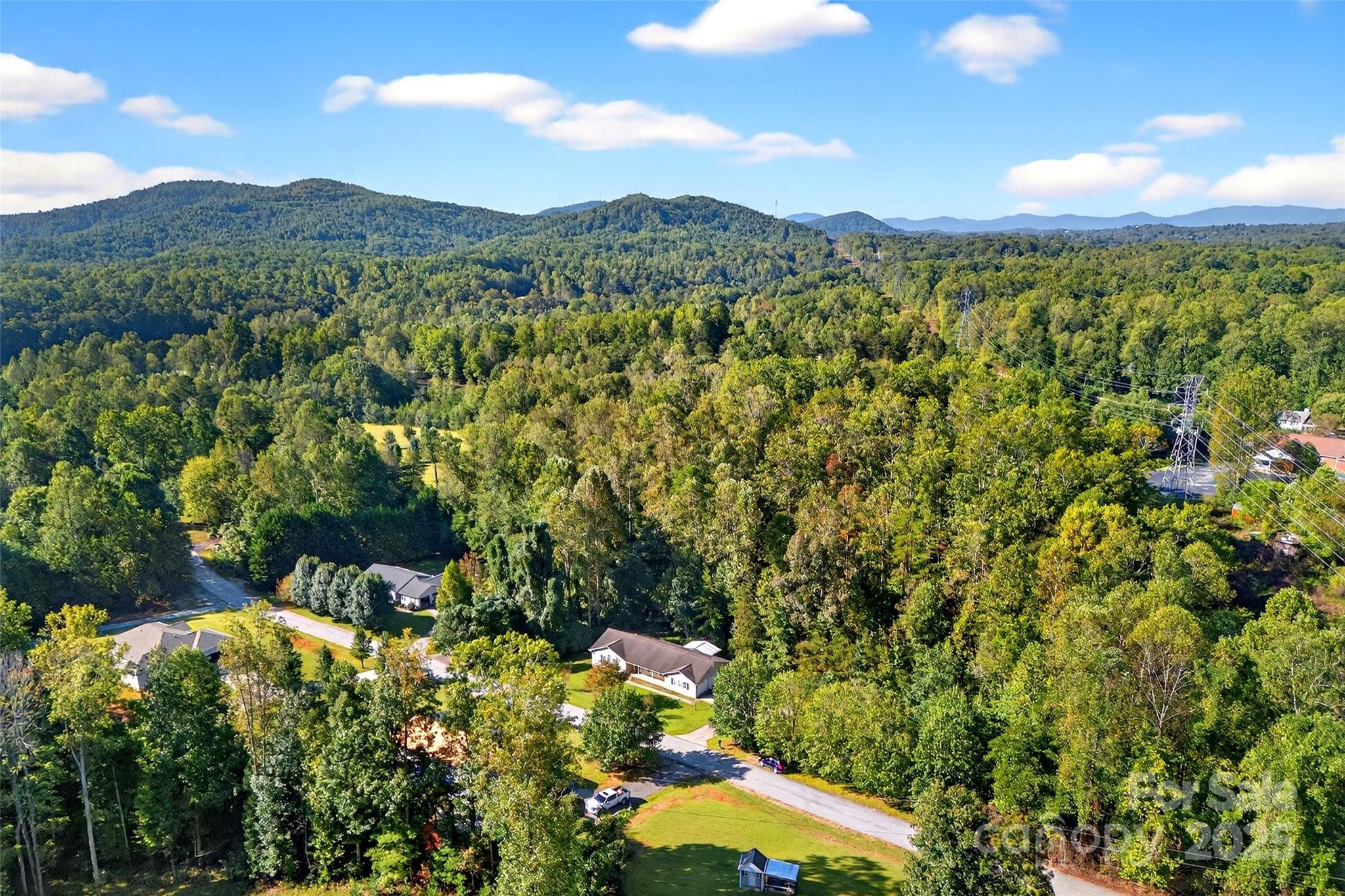 86 Springdale Drive Marion, NC 28752 - Photo 39 of 40 a view of a city with a mountain