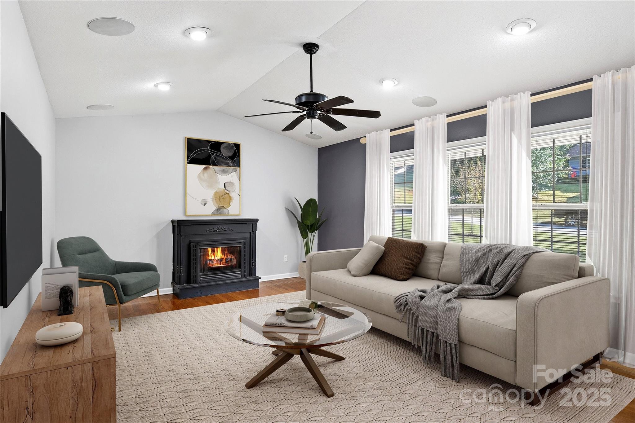 86 Springdale Drive Marion, NC 28752 - Photo 5 of 40 a living room with furniture and a fireplace