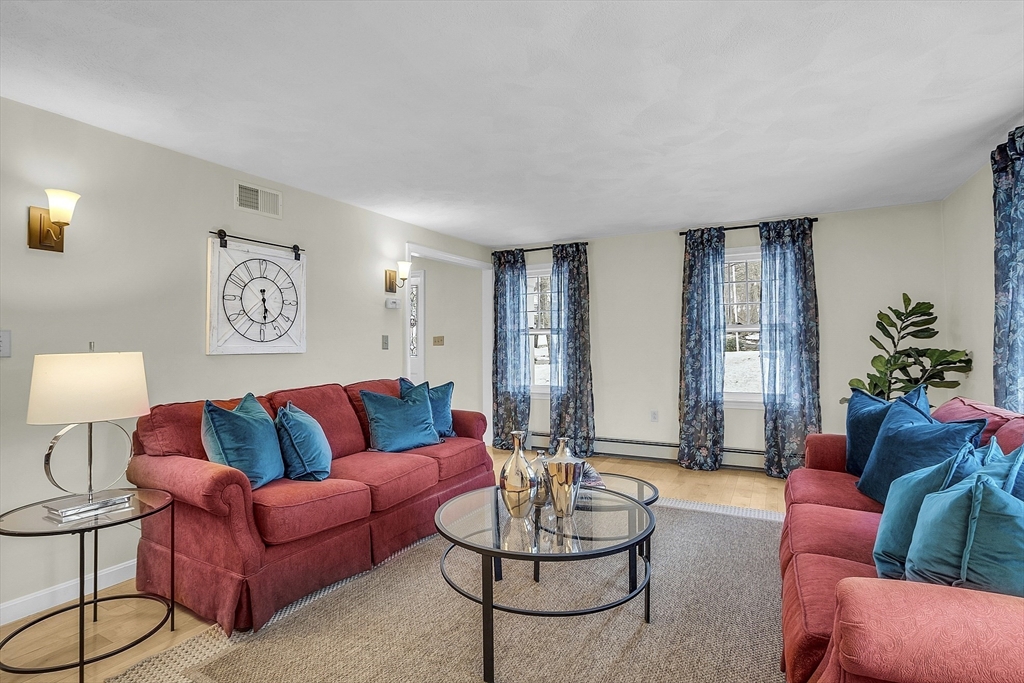 18 Greybirch Road Andover, MA 01810 - Photo 8 of 42 a living room with furniture and a potted plant