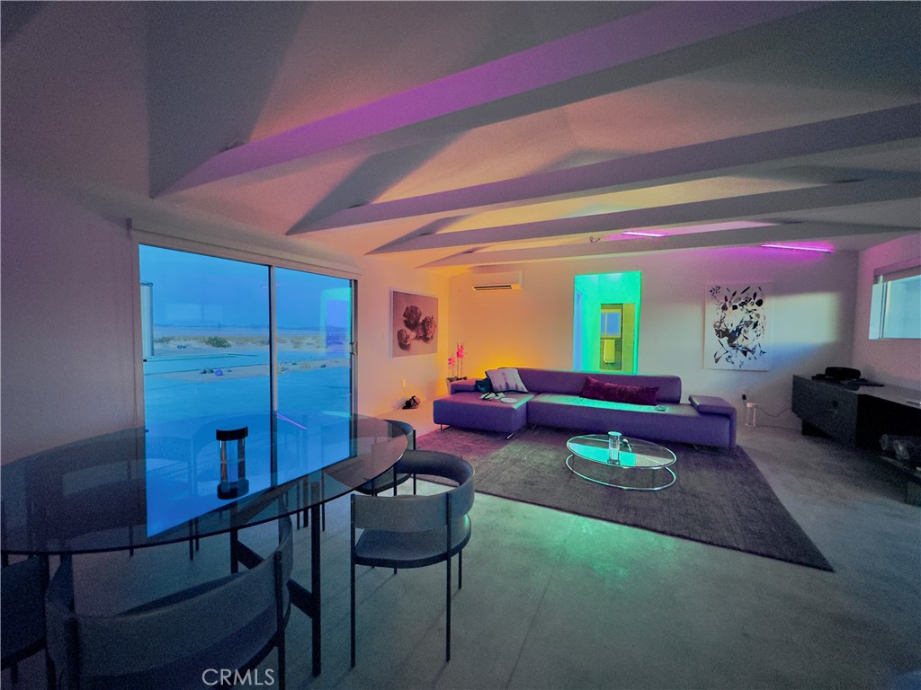 60810 Cole Lane Landers, CA 92285 - Photo 18 of 51 a living room with furniture and a potted plant