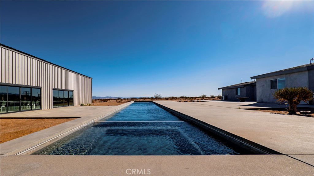 60810 Cole Lane Landers, CA 92285 - Photo 21 of 51 a swimming pool with a outdoor seating