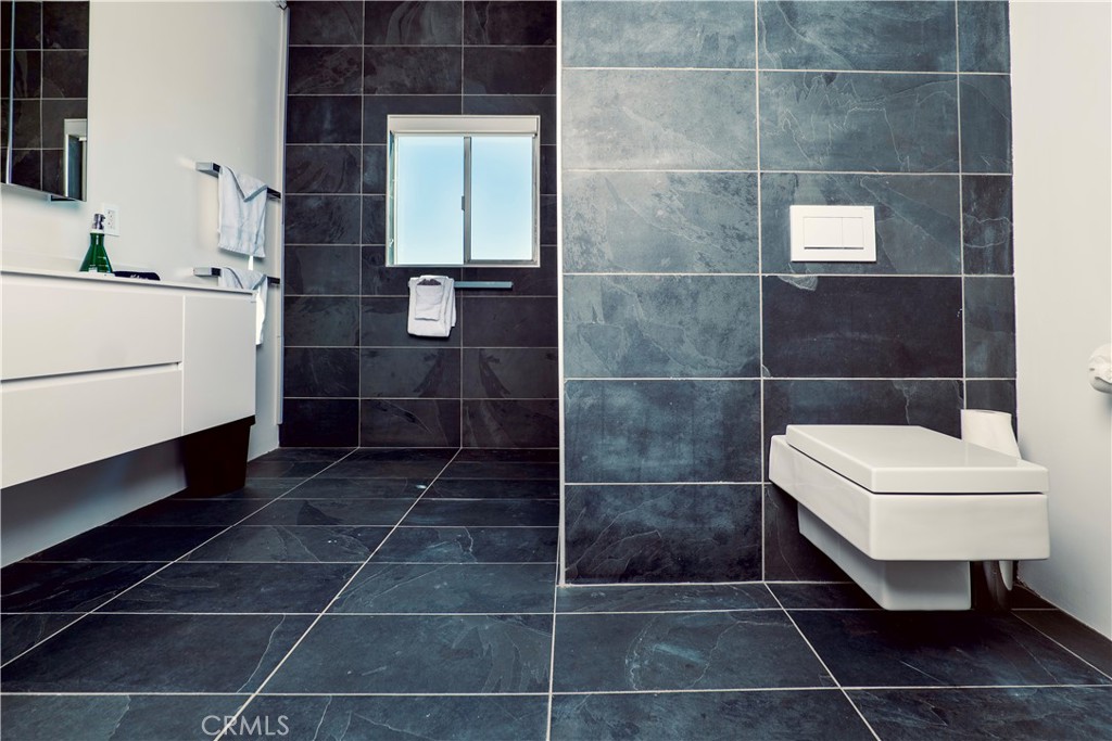 60810 Cole Lane Landers, CA 92285 - Photo 26 of 51 a bathroom with a sink toilet and shower