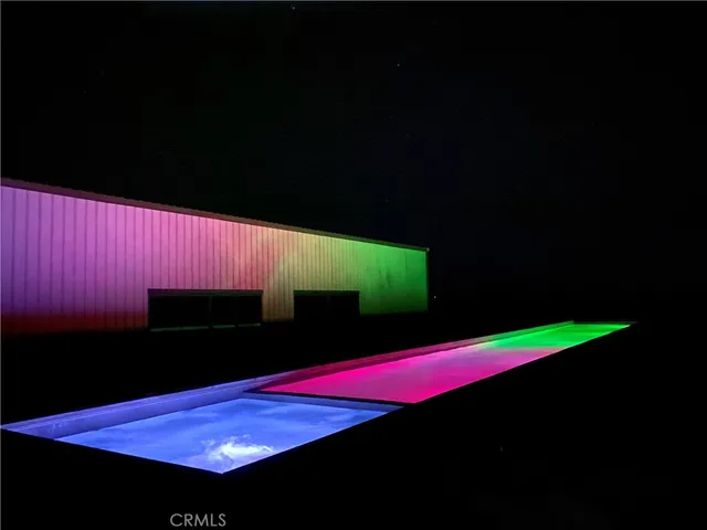 a view of a red door and chair