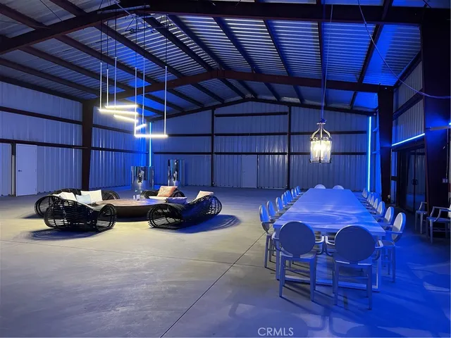 a kitchen with stainless steel appliances a sink dishwasher stove and cabinets