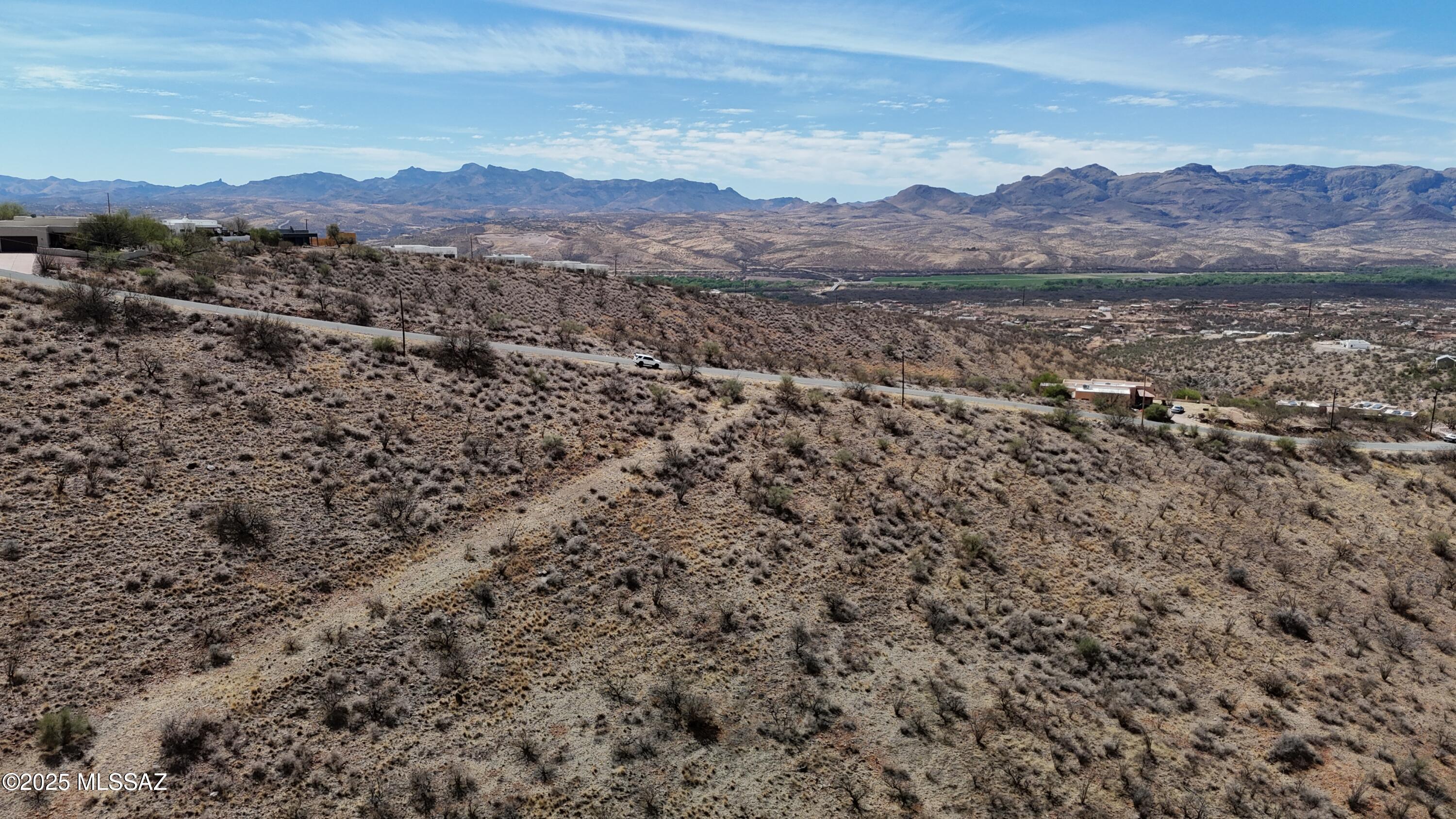 1568 Camino Esturion, Unit 9 Rio Rico, AZ 85648 - Photo 6 of 10 a view of an outdoor space with mountain view