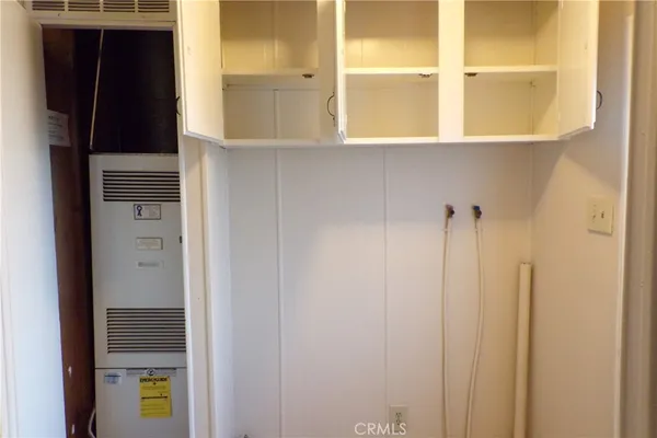 a bathroom with a window and shower