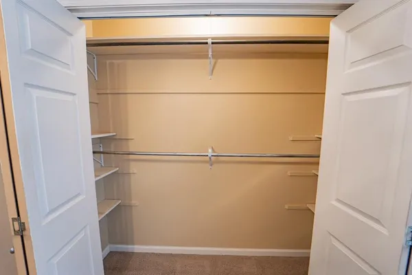 a view of a refrigerator in kitchen