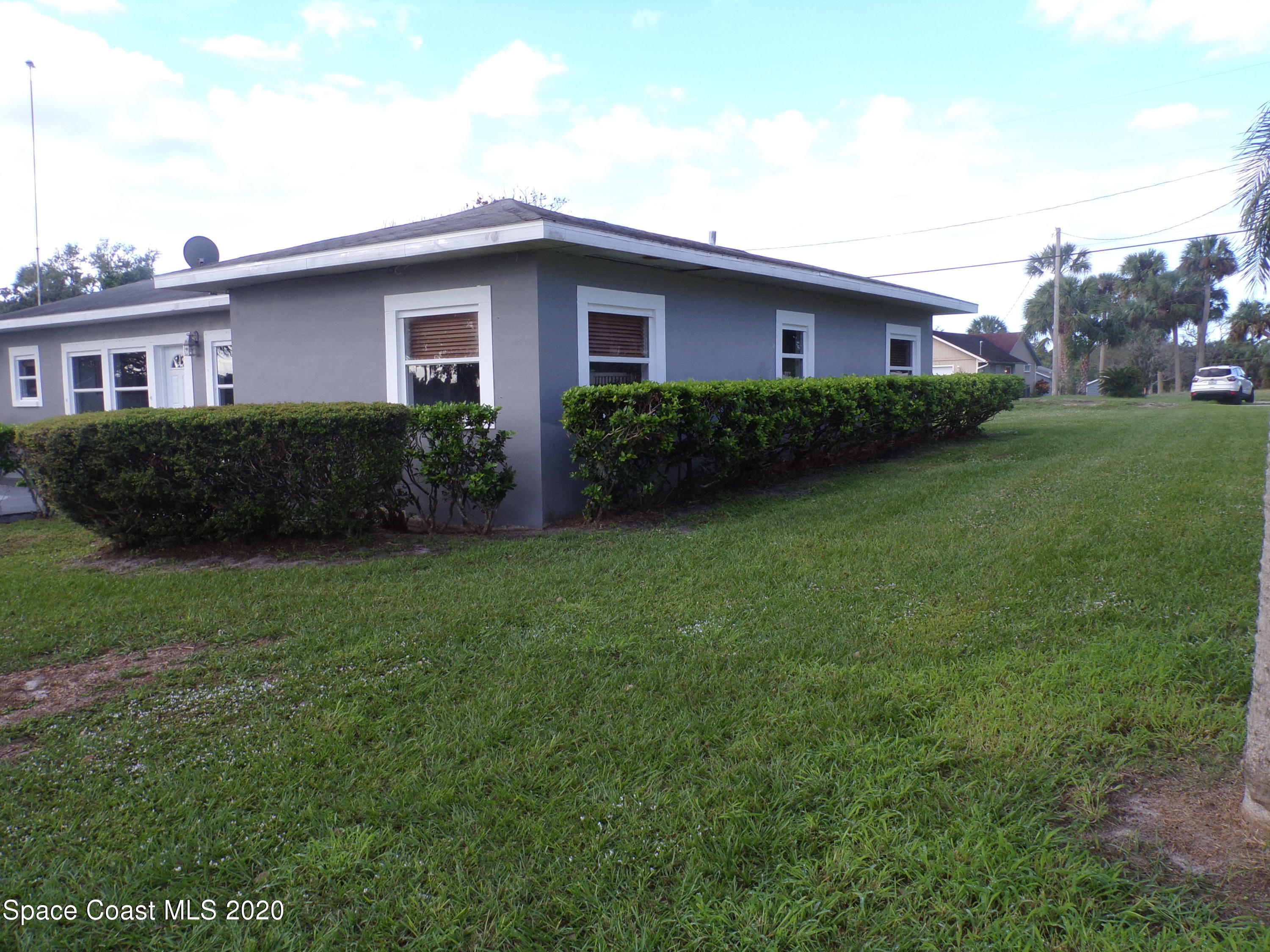 9900 Riverview Drive Micco, FL 32976 - Photo 2 of 15 NORTH SIDE