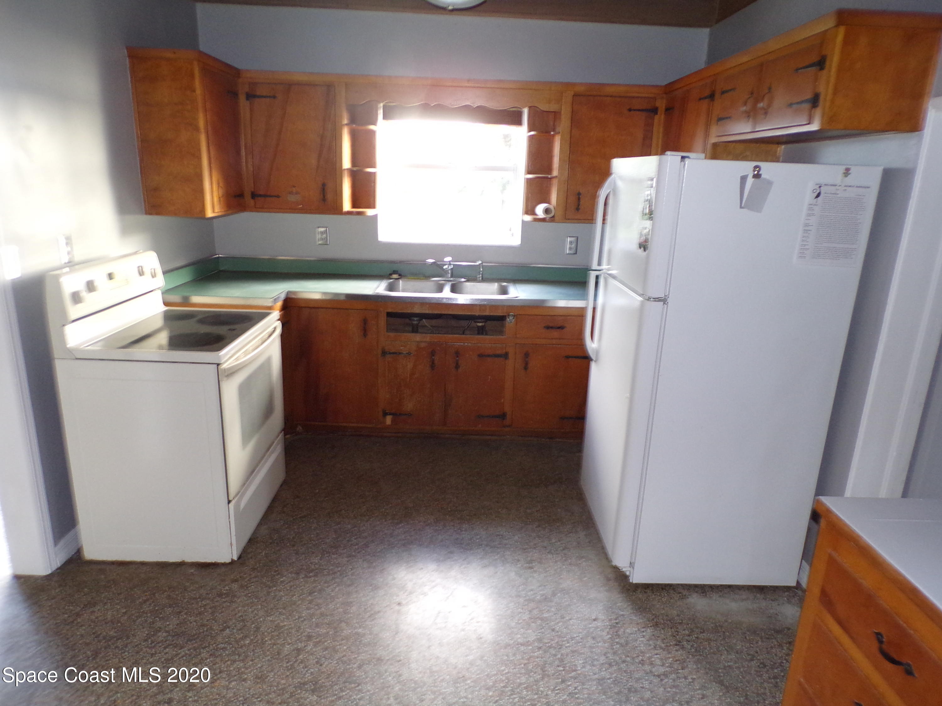 9900 Riverview Drive Micco, FL 32976 - Photo 13 of 15 KITCHEN