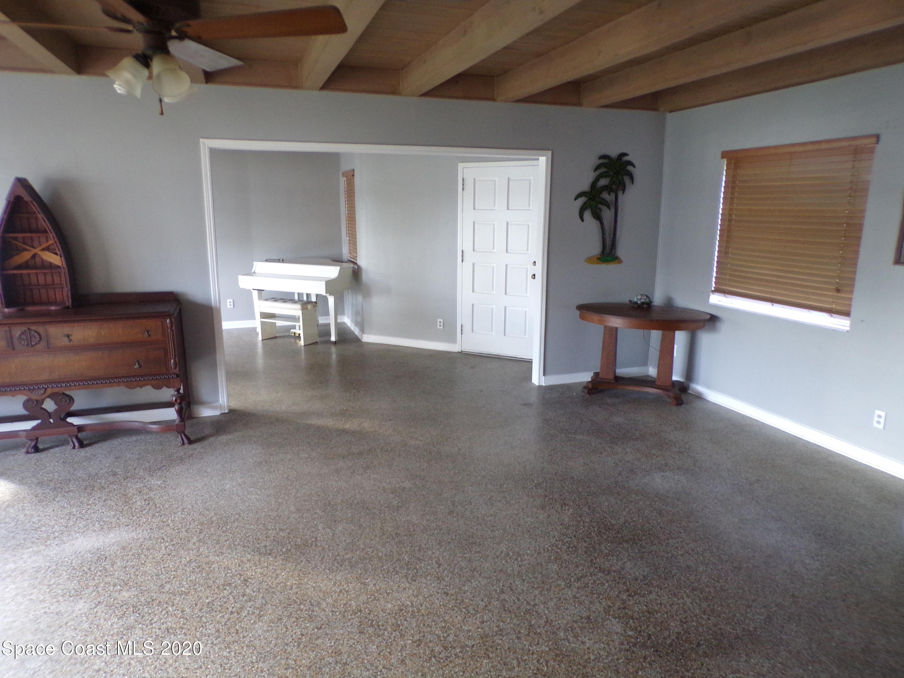 9900 Riverview Drive Micco, FL 32976 - Photo 6 of 15 LIVING ROOM