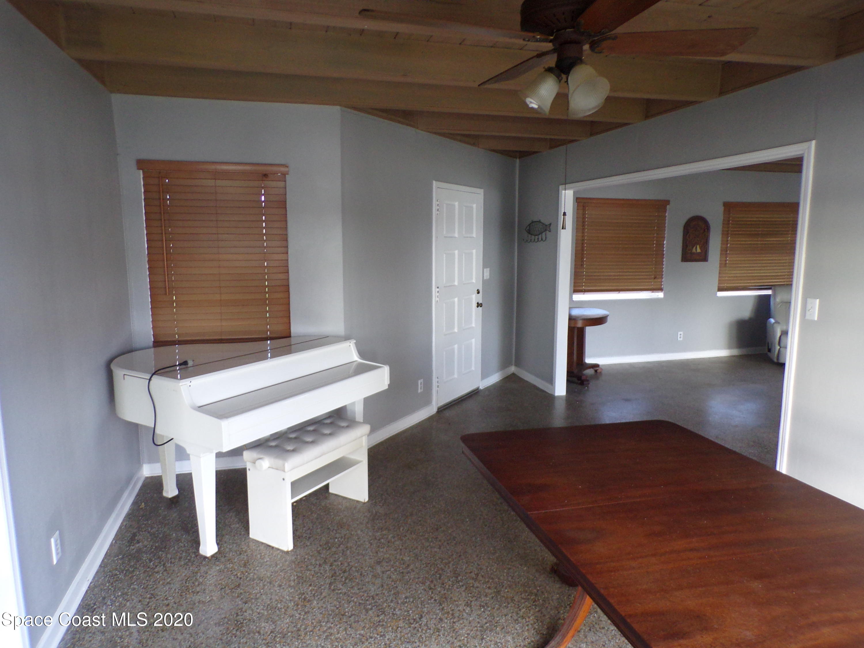 9900 Riverview Drive Micco, FL 32976 - Photo 7 of 15 DINING ROOM