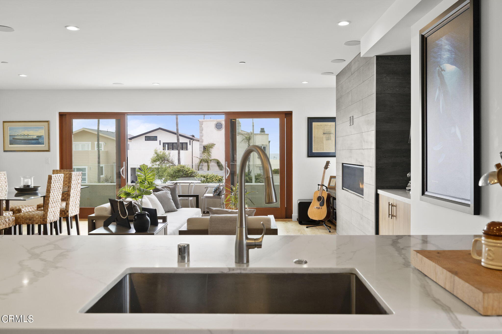 124 Ocean Drive Oxnard, CA 93035 - Photo 14 of 53 a kitchen with a sink and a mirror