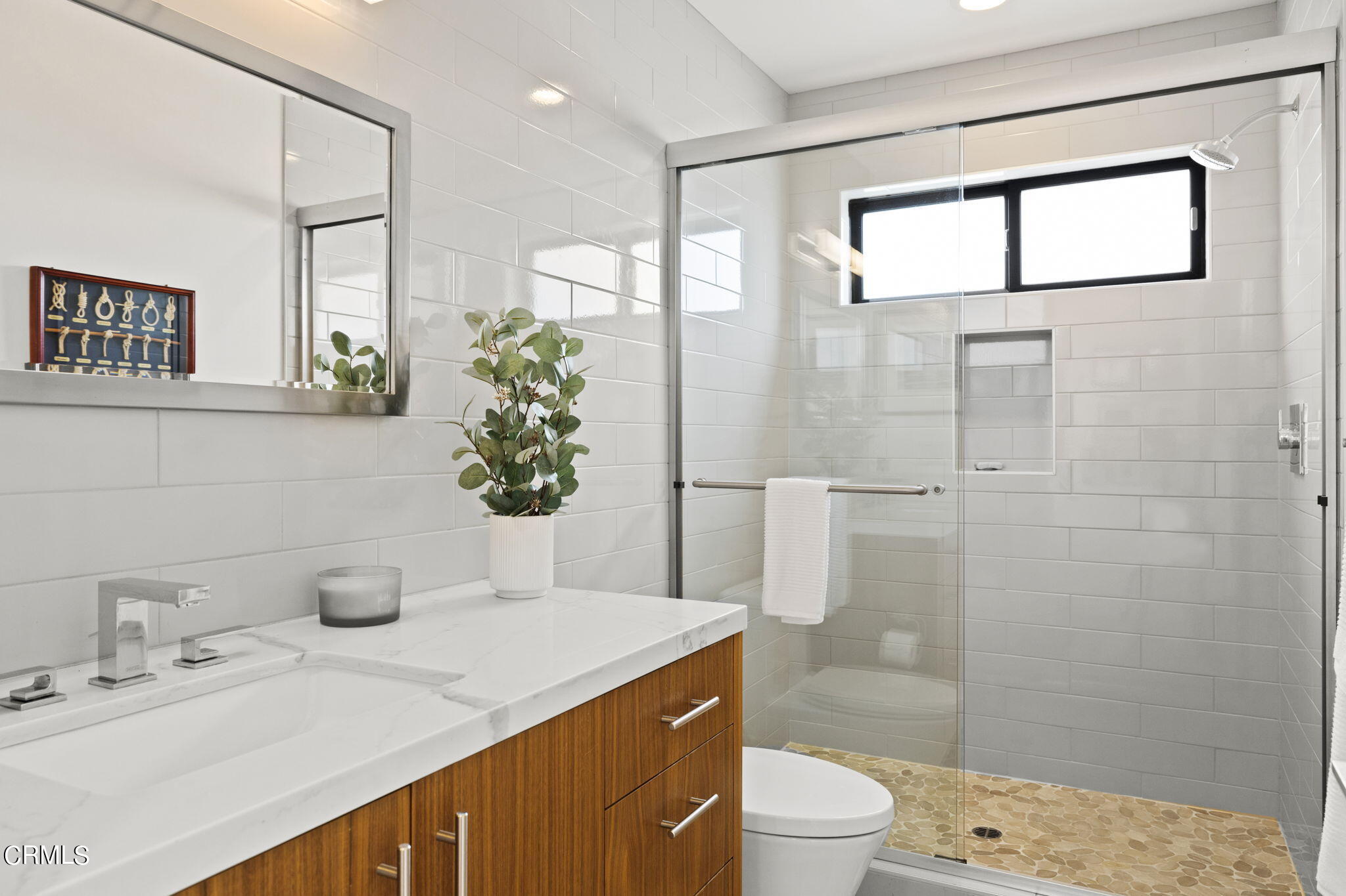 124 Ocean Drive Oxnard, CA 93035 - Photo 20 of 53 a bathroom with a sink a toilet and shower