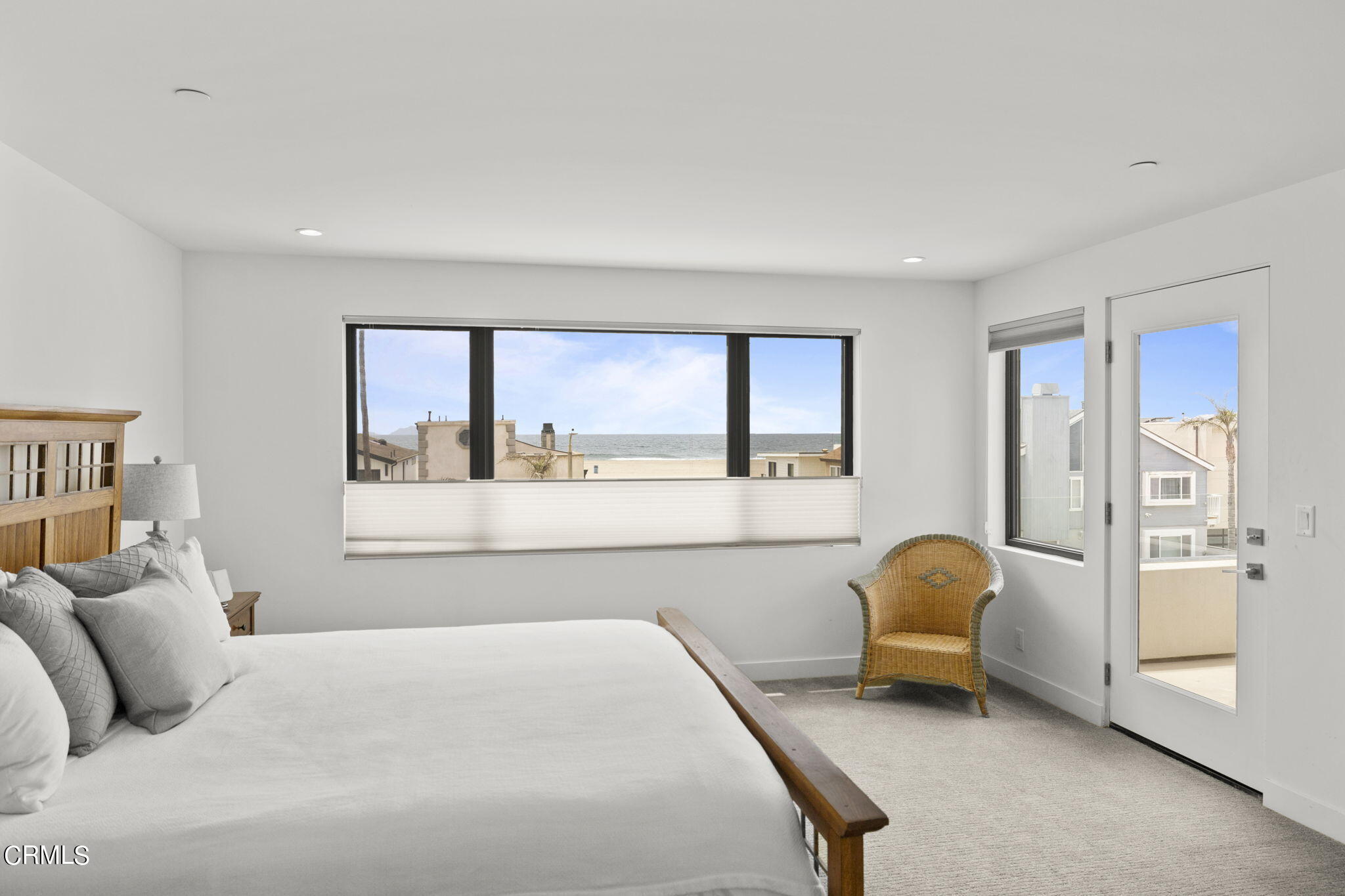 124 Ocean Drive Oxnard, CA 93035 - Photo 24 of 53 a bedroom with a bed and a large window