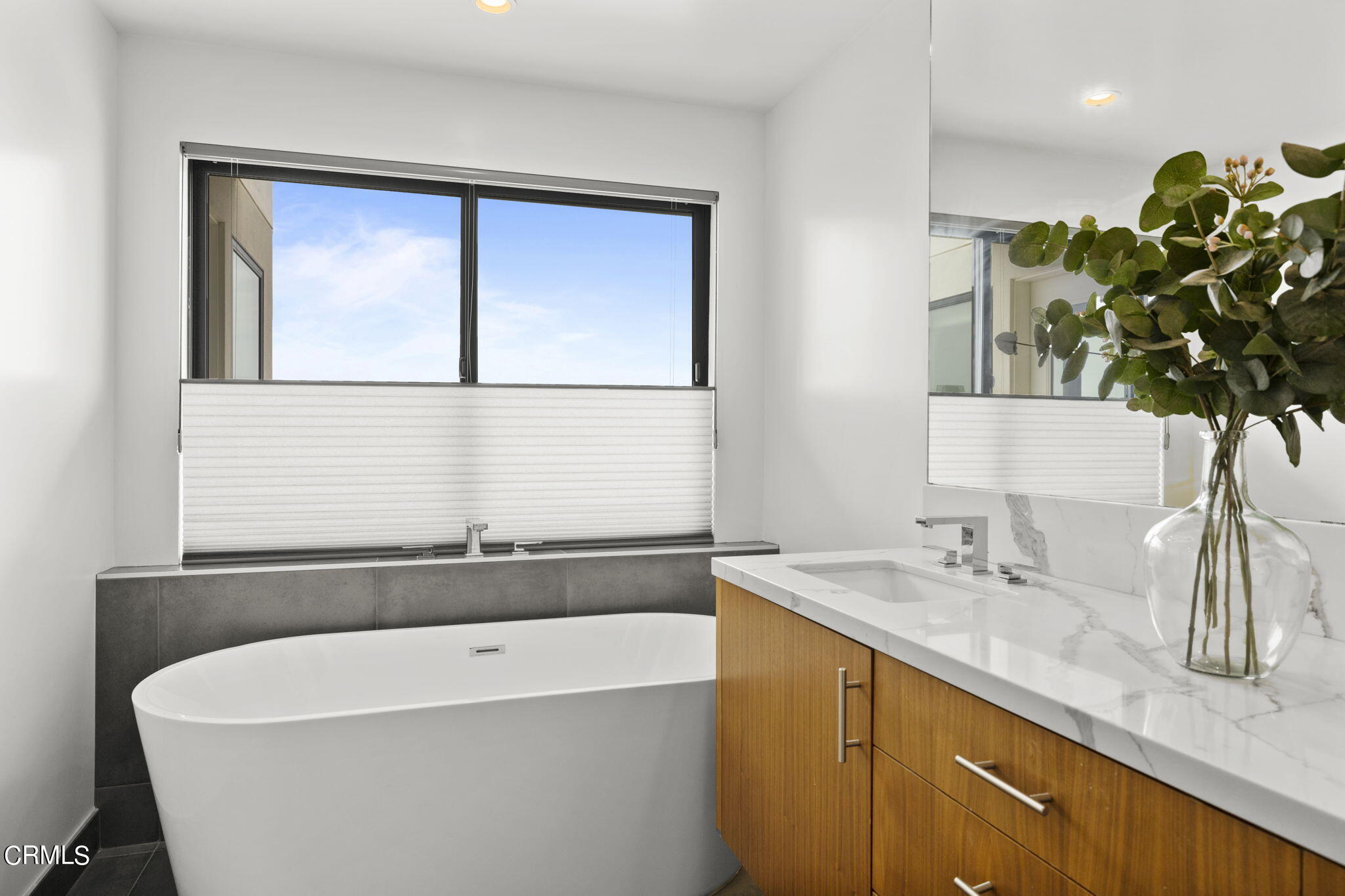 124 Ocean Drive Oxnard, CA 93035 - Photo 29 of 53 a bathroom with a bathtub and a sink