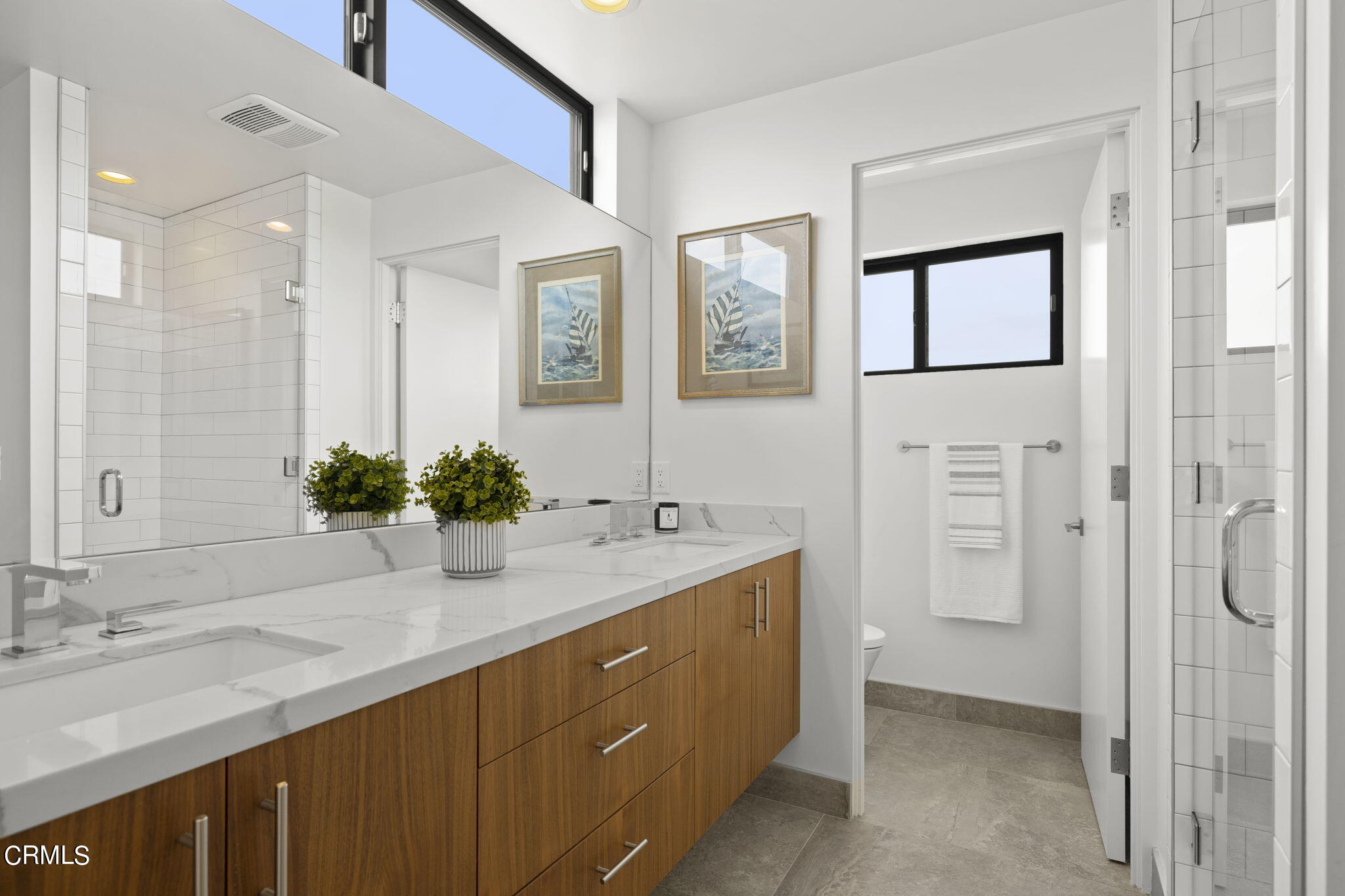 124 Ocean Drive Oxnard, CA 93035 - Photo 34 of 53 a bathroom with a double vanity sink mirror and shower