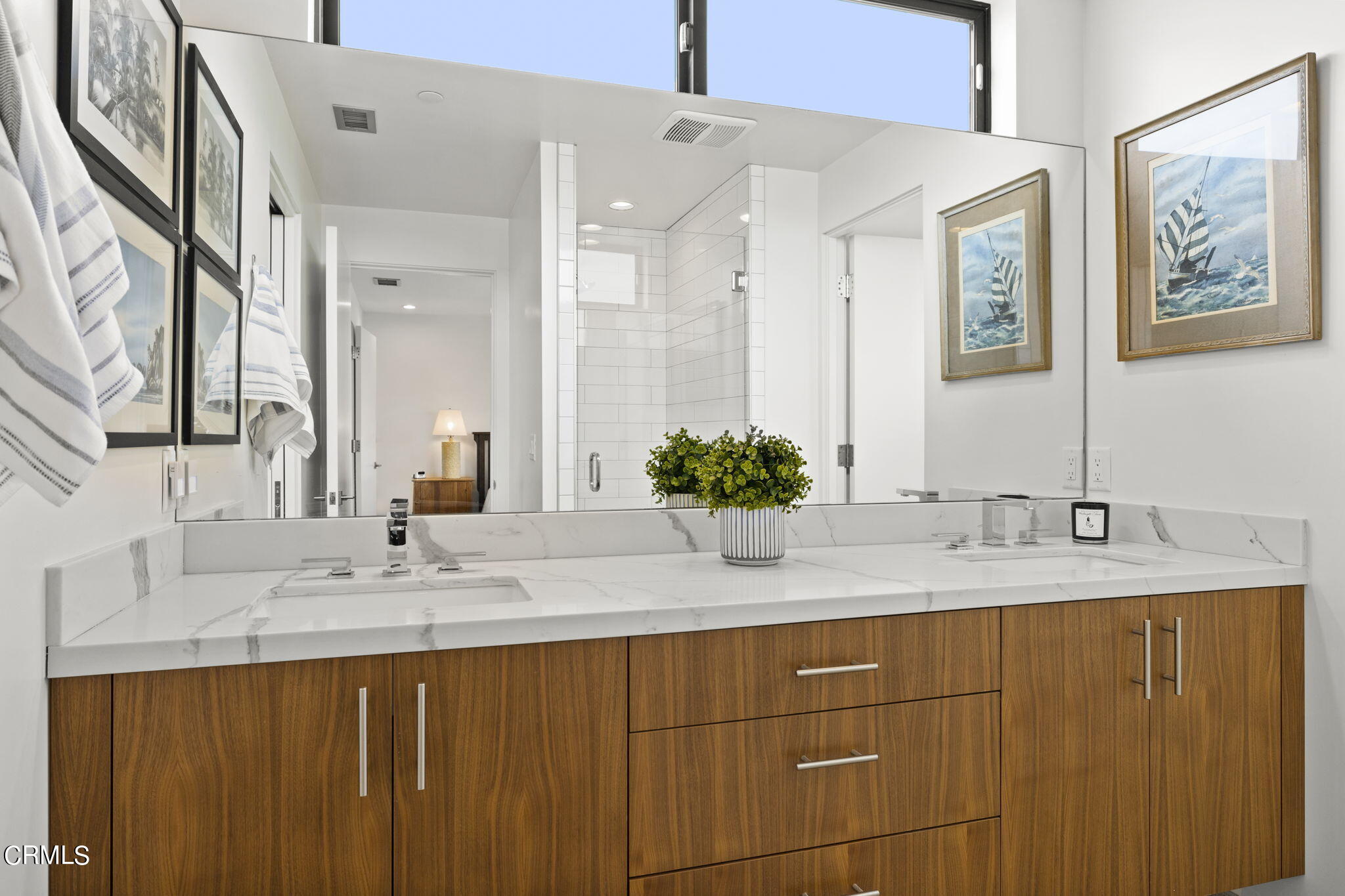 124 Ocean Drive Oxnard, CA 93035 - Photo 35 of 53 a bathroom with a sink and a mirror