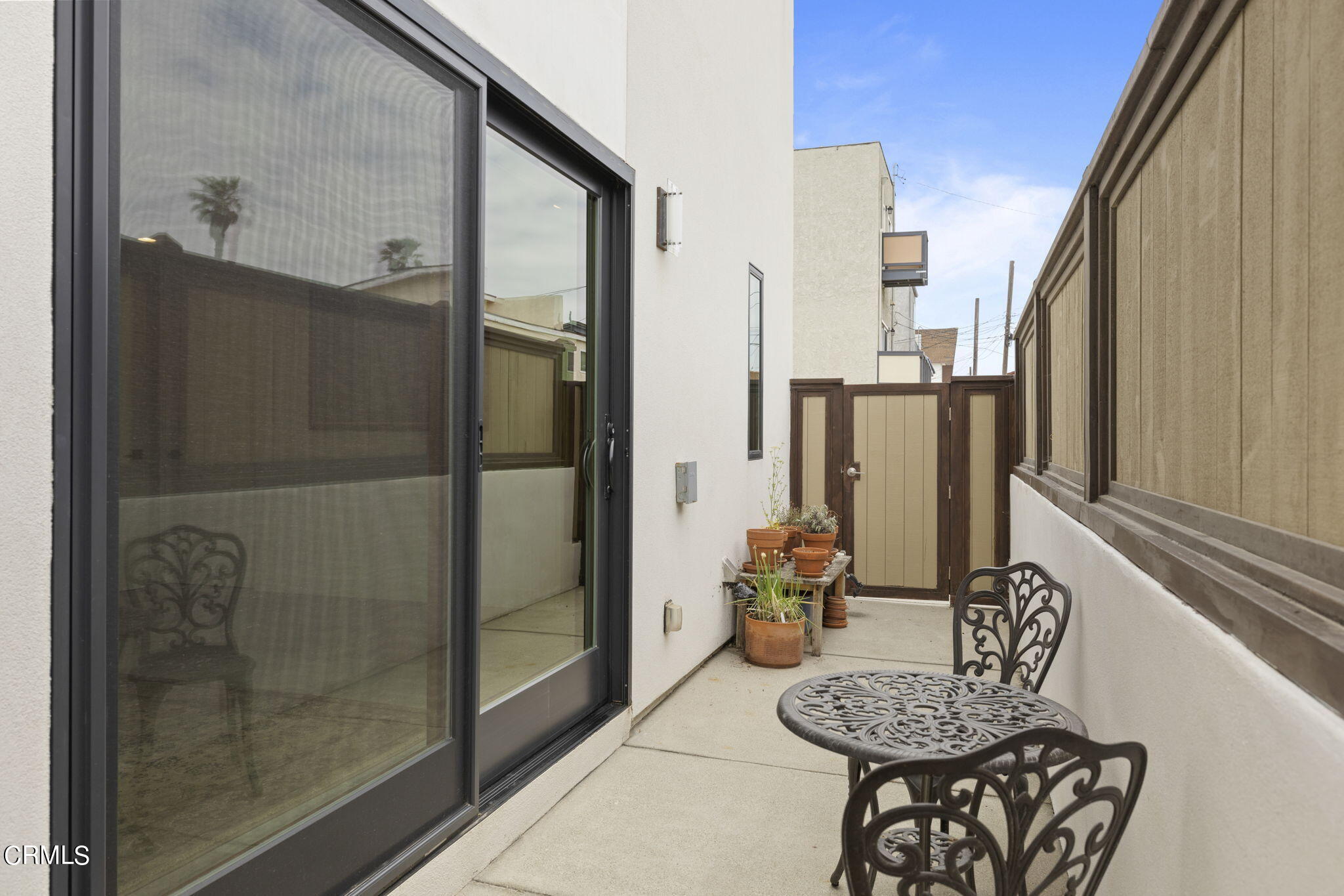 124 Ocean Drive Oxnard, CA 93035 - Photo 44 of 53 a bathroom with a granite countertop shower a mirror and a sink