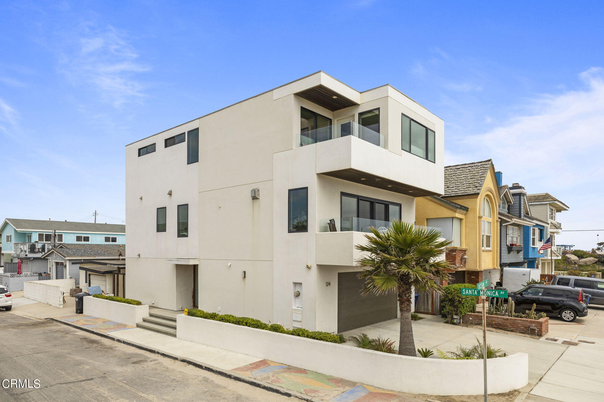 124 Ocean Drive Oxnard, CA 93035 - Photo 46 of 53 a front view of a white building with glass door