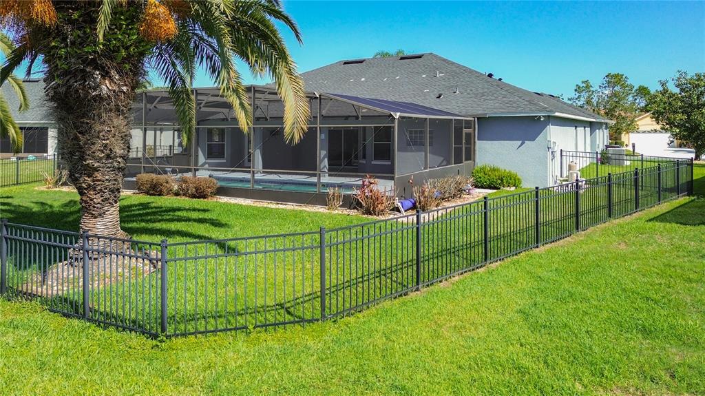 3189 Bayview Lane St. Cloud, FL 34772 - Photo 35 of 41 a front view of house with yard and green space