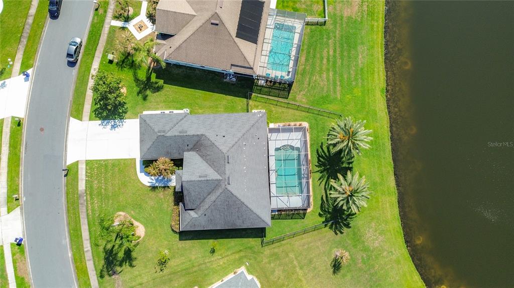 3189 Bayview Lane St. Cloud, FL 34772 - Photo 37 of 41 an aerial view of a house with swimming pool
