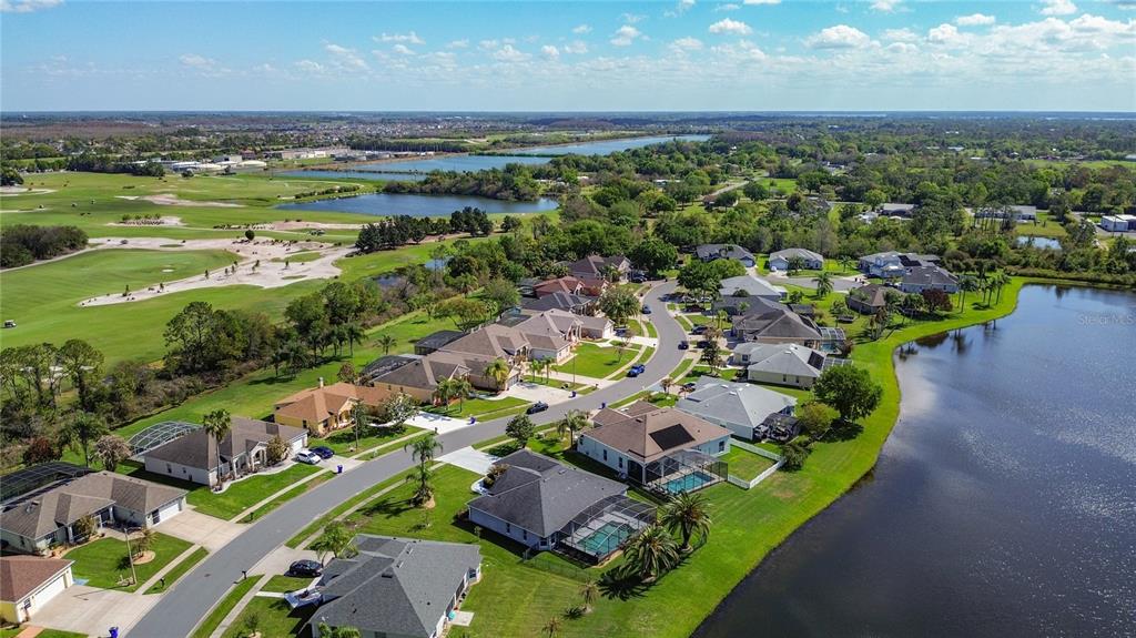3189 Bayview Lane St. Cloud, FL 34772 - Photo 40 of 41 an aerial view of a houses with a lake view