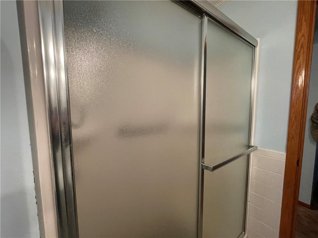 616 Methodist Road Greenville, PA 16125 - Photo 18 of 42 a bathroom with a glass shower door