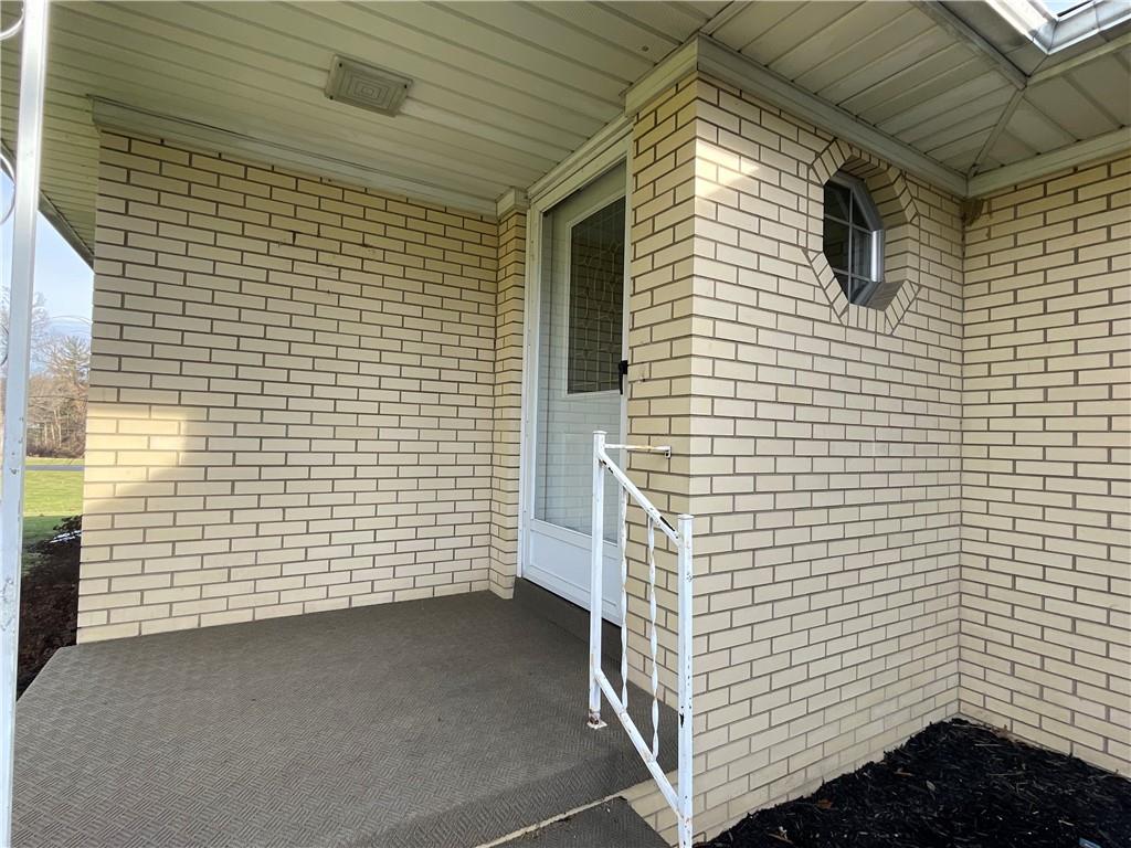 616 Methodist Road Greenville, PA 16125 - Photo 3 of 42 a view of a door and brick wall