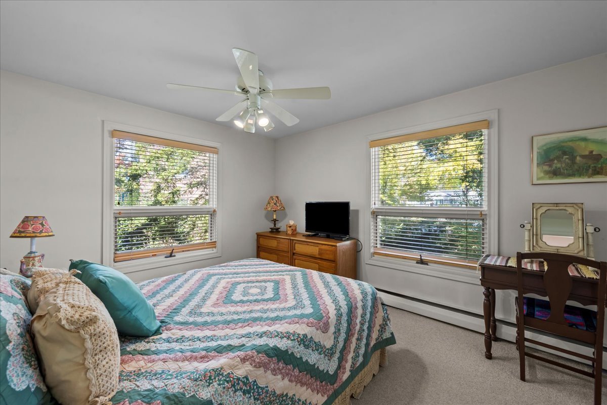 1140 Ridge Road Highland Park, IL 60035 - Photo 20 of 31 a bedroom with a bed and a large window