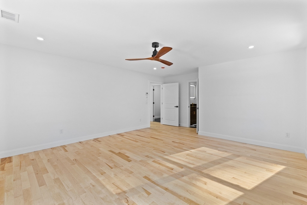 36 Jade Hill Road Auburn, MA 01501 - Photo 18 of 40 a view of empty room with wooden floor