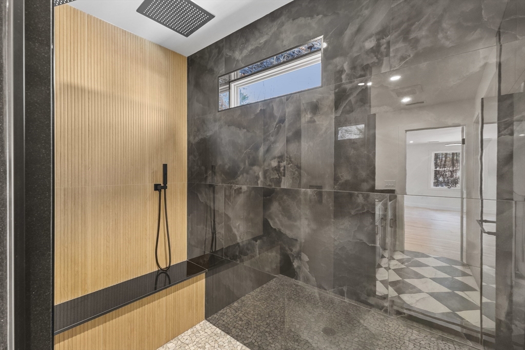 36 Jade Hill Road Auburn, MA 01501 - Photo 22 of 40 a bathroom with a glass shower door