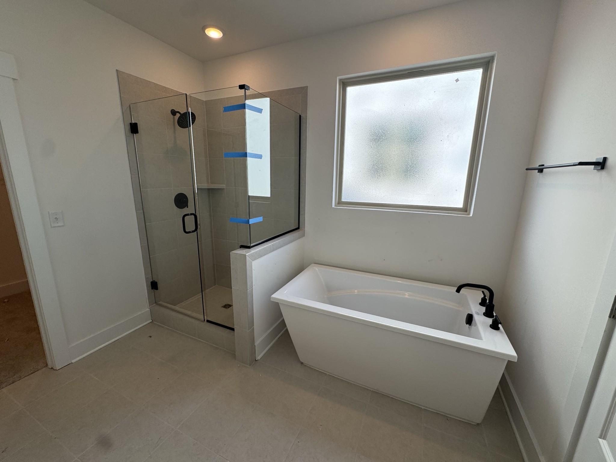 105 Rock Chimney Road Gallatin, TN 37066 - Photo 3 of 93 a bathroom with a tub a window and a shower