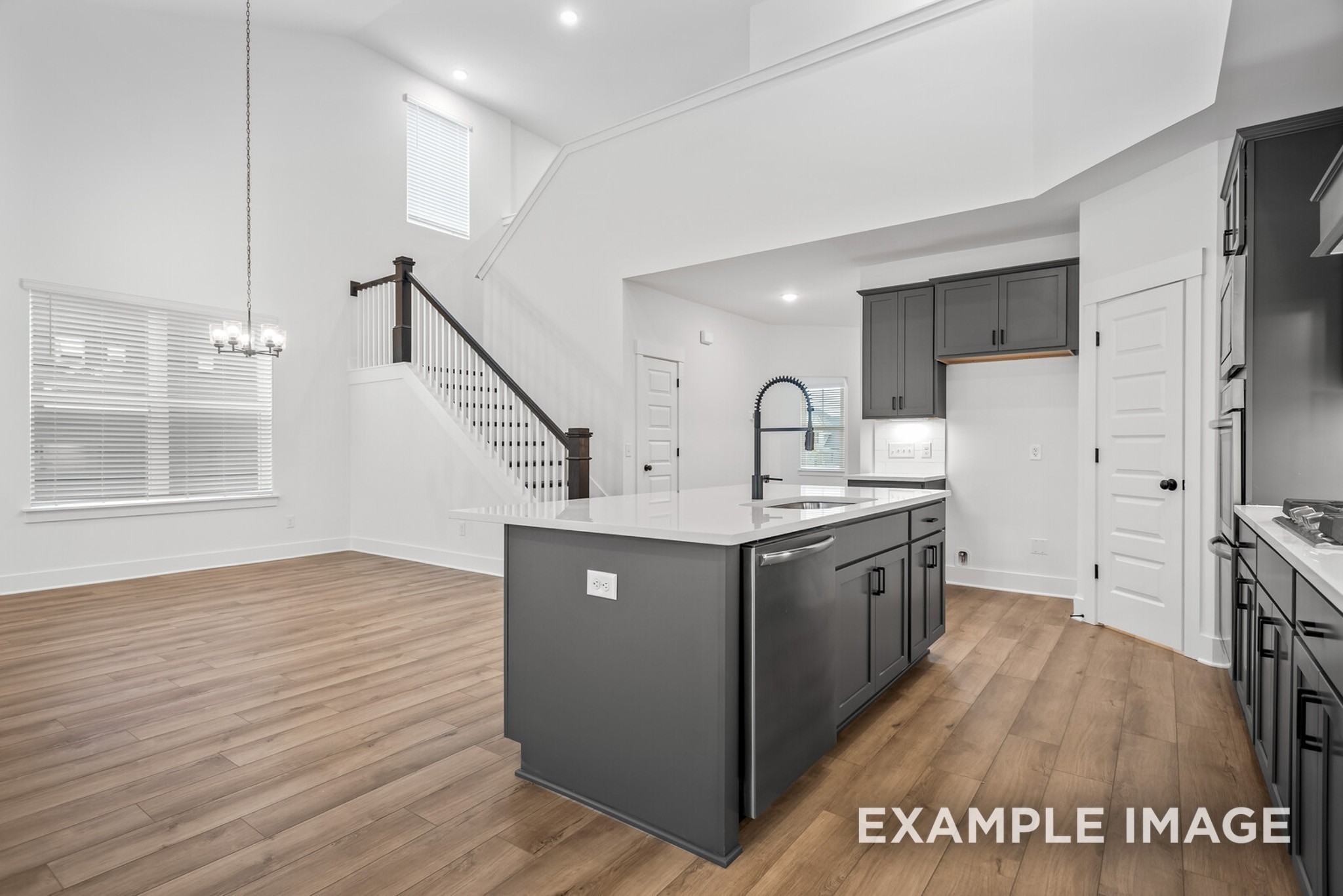 105 Rock Chimney Road Gallatin, TN 37066 - Photo 57 of 93 a kitchen with stainless steel appliances granite countertop a sink cabinets and wooden floor